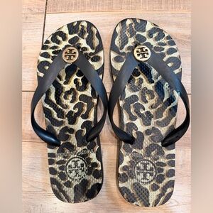 Tory Burch Black Strappy Flip Flops with Leopard Print Footbed and Gold Logo